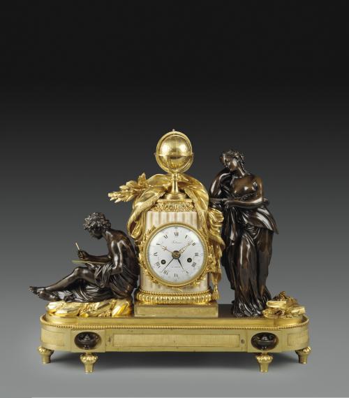 *mantle clock in gilt bronze, flanked by with figures bronze figures with books representing Study and Philosophy