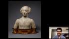 video still of Giulio Dalvit and marble bust of woman