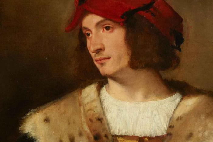 portrait of man with red cap and fur coat