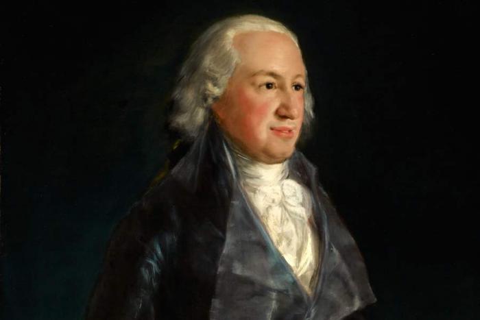 portrait of a man in blue coat with white hair