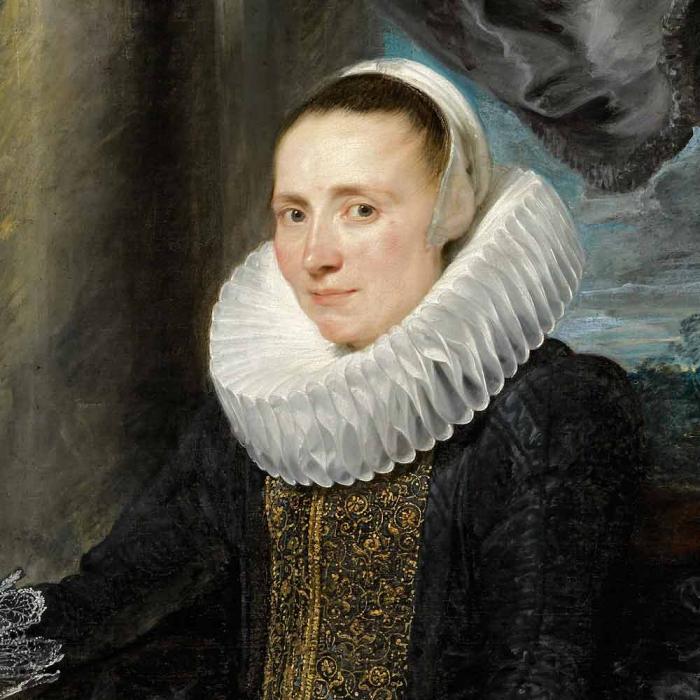 portrait of a woman in black and gold dress