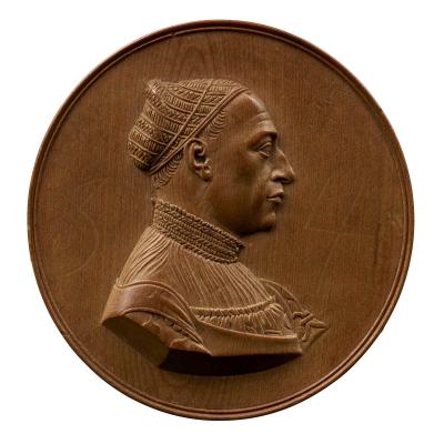 Wooden model for a portrait medal of Matthaeus Schwarz wearing a hat in profile to the right