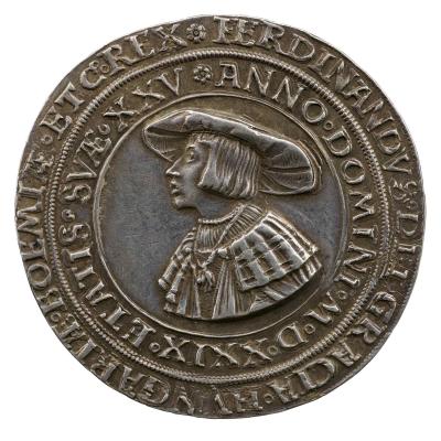 Silver medal of a man in profile to the left wearing a hat and collar with the Order of the Golden Fleece