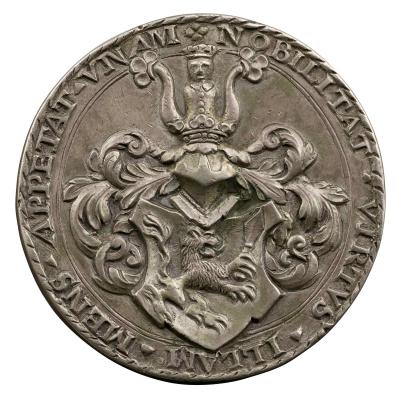 Silver medal depicting a plumed helmet above a shield with a lion holding a sword