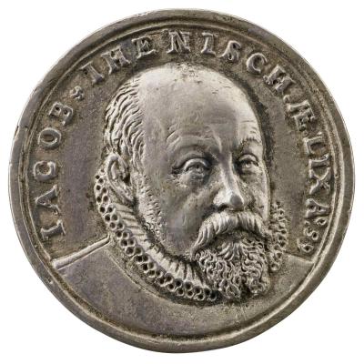 Silver medal of a balding man with mustache and beard, wearing a ruff and facing three quarters to the right