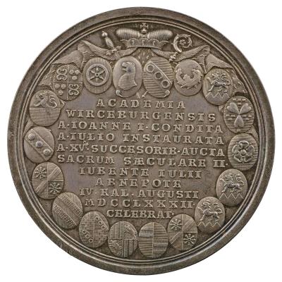 Silver medal with an inscription