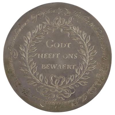 Silver medal with Dutch inscriptions inside an olive wreath