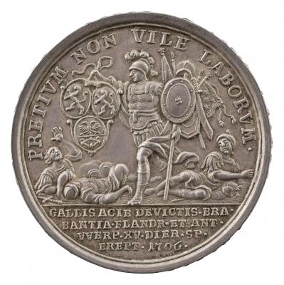 Silver medal depicting the figure of mars leaping over defeated soldier with shields in his hand
