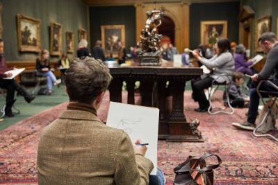 man sketching in The Frick Collection gallery