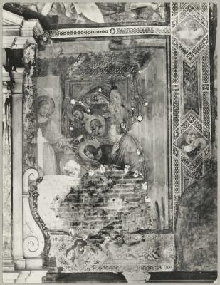 Religious wall fresco with chunks and sections of plaster missing from damage