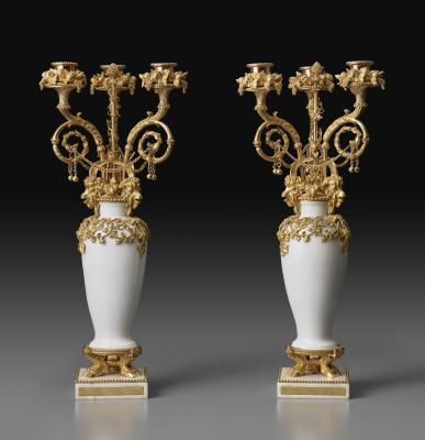 pair of gilt-bronze candelabra, circa 1782, with hard-paste porcelain and marble elements