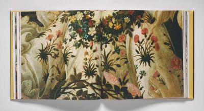 Open spread of a book featuring a painting detail of a dress covered in vines, leaves, and flowers