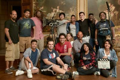 students with filming gear in Frick gallery