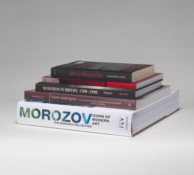 Stack of five art history books with spines showing