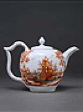 white porcelain teapot with deep orange landscape 