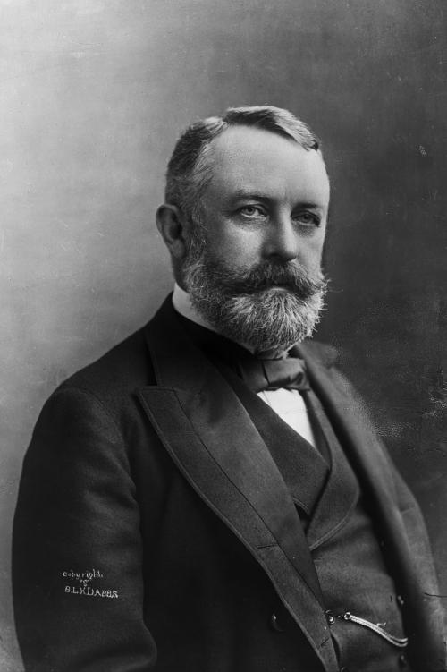 black and white photograph of seated henry clay frick wearing vest and suit