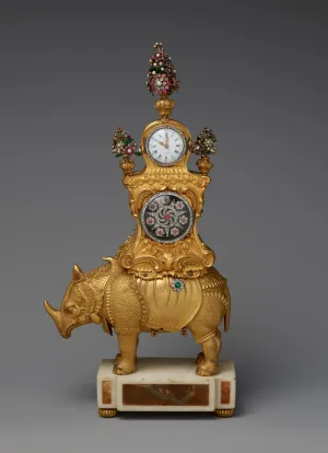 gilt bronze rhinoceros on stand with clock on top of its back