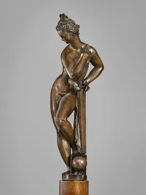 Bronze sculpture of a standing woman, leaning on a post, front view.