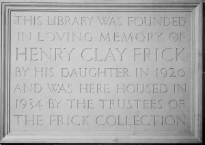Plaque inscribed with "This library was founded in loving memory of Henry Clay Frick by his daughter in 1920 and was here housed in 1934 by the Trustees of the Frick Collection"