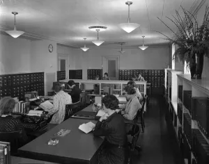 women in library work room, circa 1935