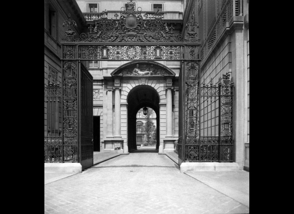 outdoor open gate leading through to archway